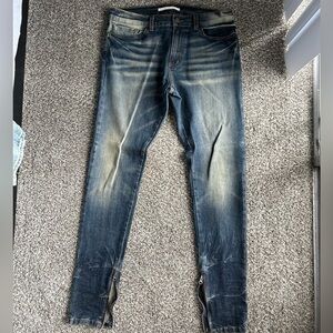 “Golden” dark blue jeans